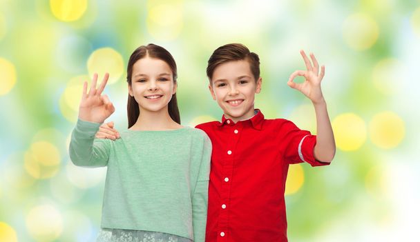 happy boy and girl showing ok hand sign - Fotografie, Obrázek