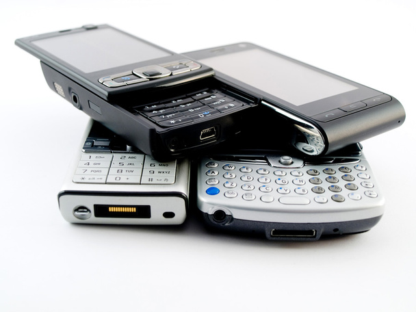 cztery nowoczesne telefony komórkowe pda smartphone - Zdjęcie, obraz