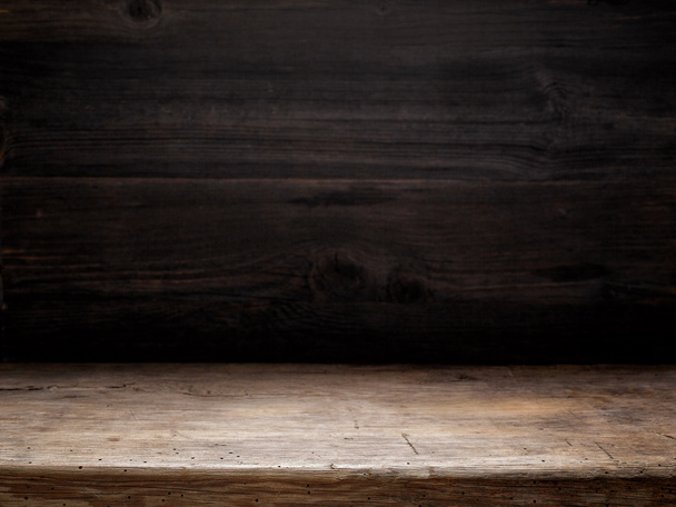 木製のテーブルや暗い木製の壁 - 写真・画像