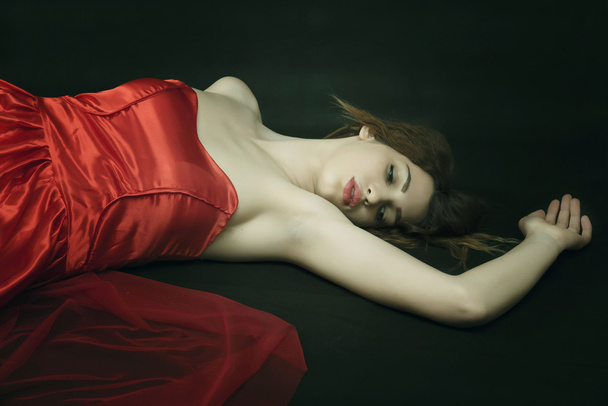 Beauty girl in  red dress - Фото, изображение