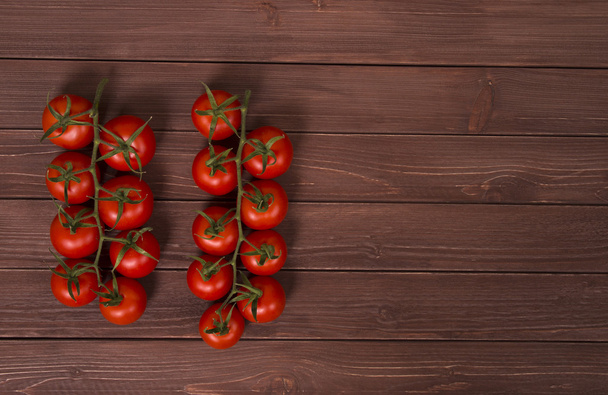 tomatoes on wood background - Photo, Image