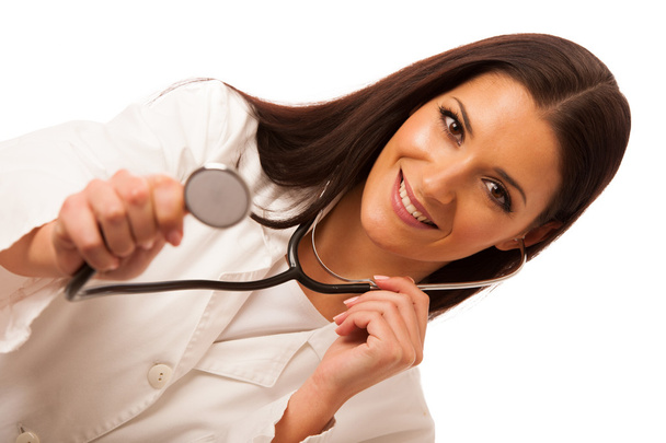 Woman doctor listen to heartbeating with stethoscope. - Foto, imagen