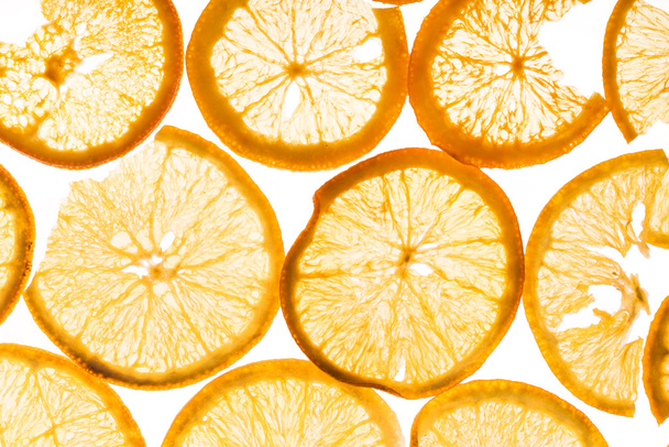 orange slices on white - Foto, afbeelding