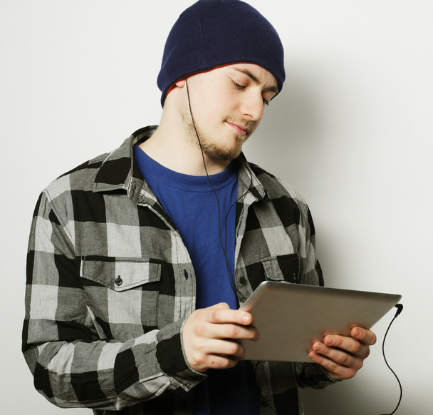 handsome young man working on digital tablet - Foto, Imagem