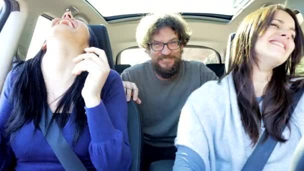 People shouting laughing and dancing in car happy - Felvétel, videó