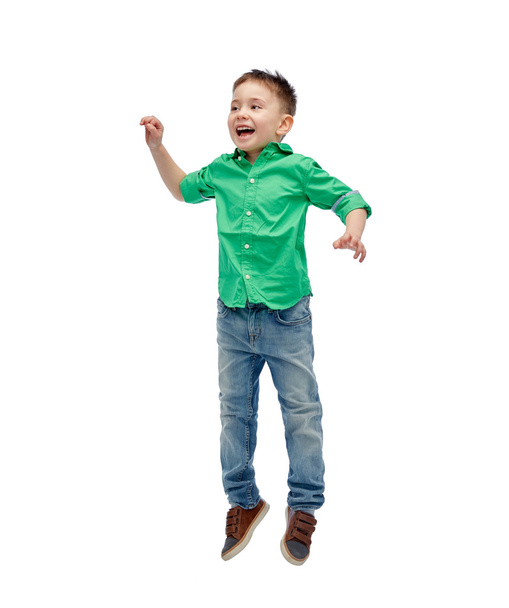 happy little boy jumping in air - Zdjęcie, obraz