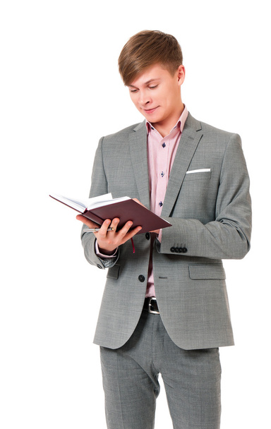 Young businessman in suit with notepad - Foto, immagini