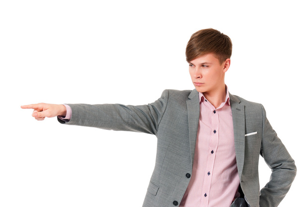 Young businessman showing empty copyspace - Photo, image