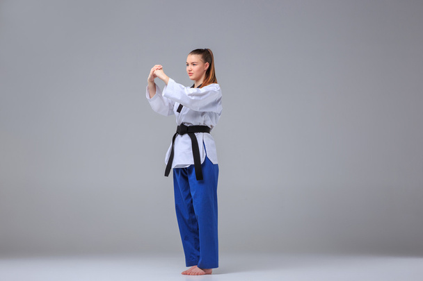 The karate girl with black belt - Zdjęcie, obraz