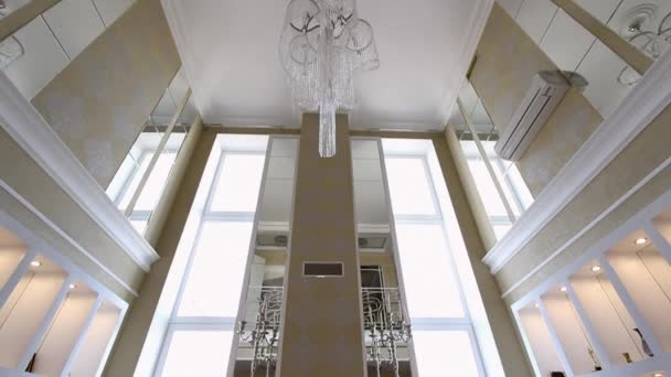 A large crystal chandelier on the ceiling. - Footage, Video