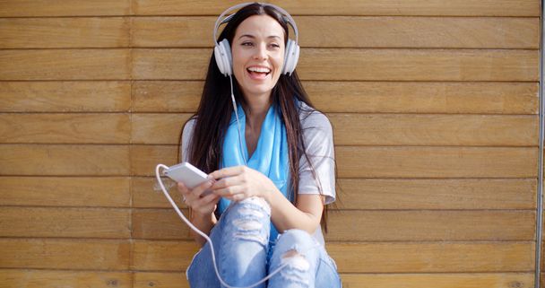 woman enjoying music on stereo headphones - Photo, Image