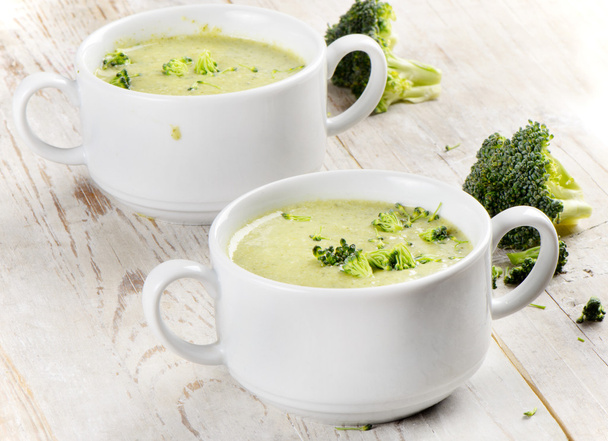 Broccoli soup on a wood background - Photo, Image