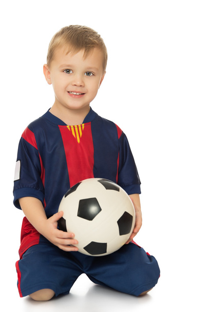 Boy holding soccer ball - Фото, зображення