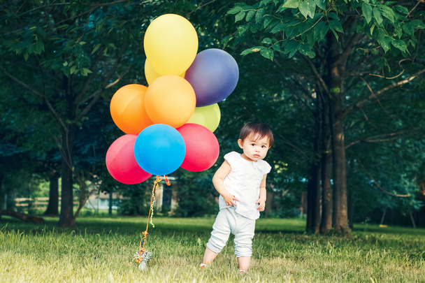 Portrait of asian girl with balloons - 写真・画像