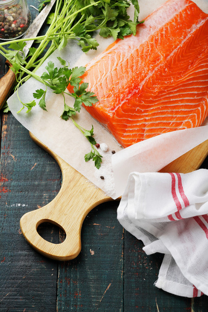 cutting fresh salmon fillet - Photo, Image