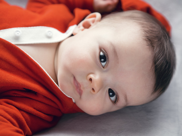 Cute Caucasian baby boy girl black eyes - Photo, Image