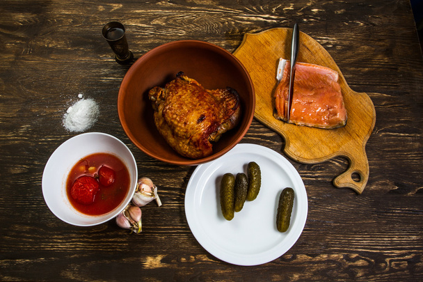Still Life With grilled meat of turkey and salt salmon fillet  - Photo, Image