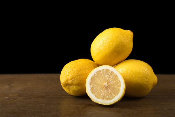 Lemons on a wooden table - Photo, Image
