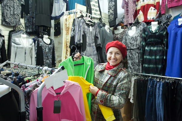 Woman chooses clothes - Fotoğraf, Görsel