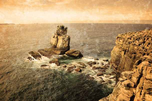 Beautiful rocks in water. Atlantic ocean coast near Peniche (Portugal).  Retro aged photo with scratches. - Φωτογραφία, εικόνα