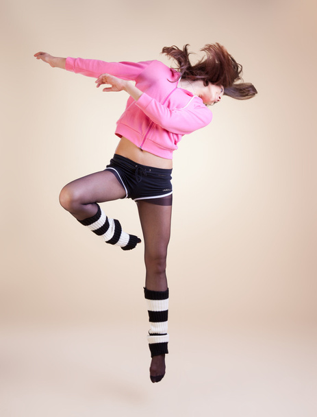 Modern ballet dancer dancing on the white studio background - Fotó, kép
