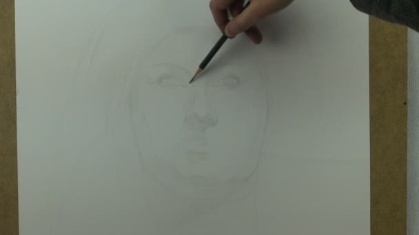Beginning of drawing of young woman - Video