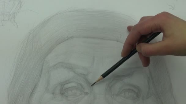 Drawing a study of old model's eye with graphite pencil - Footage, Video