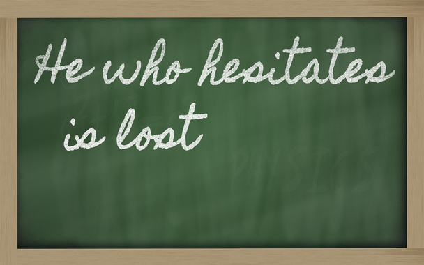 Expression - He who hesitates is lost - written on a school bla - Photo, Image