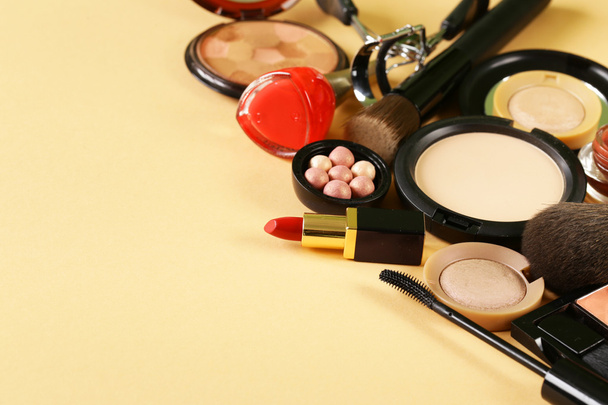 cosmetics set for make-up (face powder, lipstick, mascara brush, nail polish, blush, eye shadow) - Photo, Image
