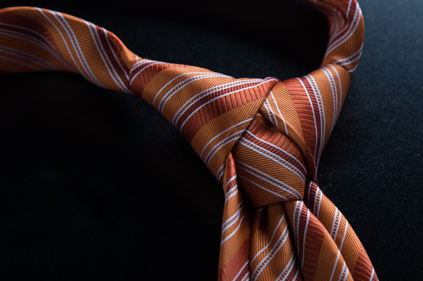 Oranje stropdas knoop - Foto, afbeelding