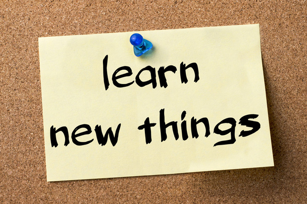 Learn new things - adhesive label pinned on bulletin board - Photo, Image