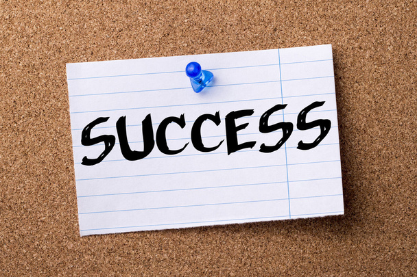 SUCCESS - teared note paper  pinned on bulletin board - Photo, Image