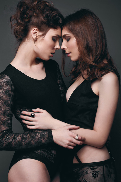 Portrait of two beautiful, sensual brunette models-twins - Photo, image