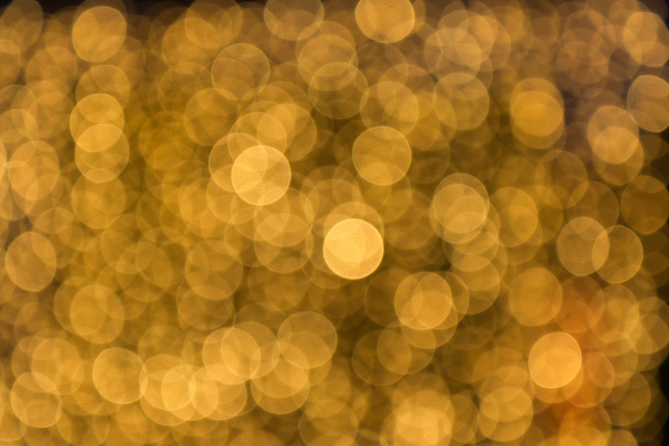 Abstract light celebration blur background, golden lights. - Photo, Image