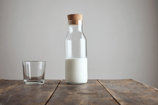Bottle with milk near rox isolated on table - Фото, зображення