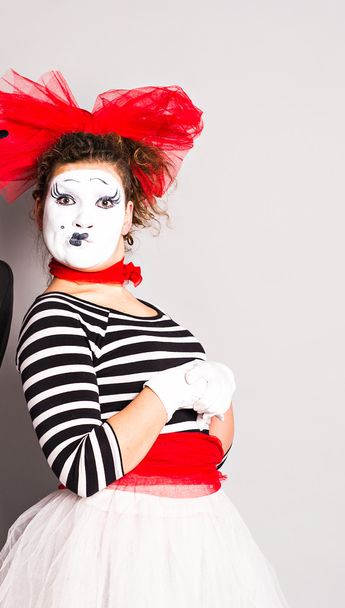 A woman clown mime posing in studio, april fools day concept - Fotoğraf, Görsel