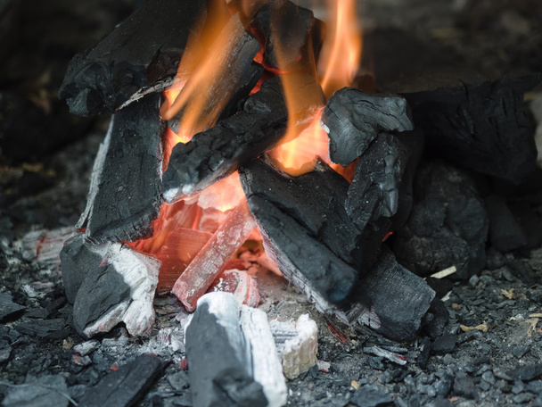Charcoal fire under barbecue - Photo, Image