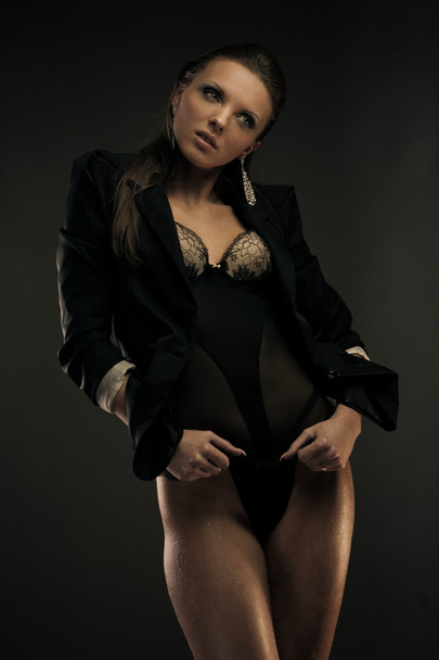 Beautiful woman in jacket and lingerie - Fotó, kép