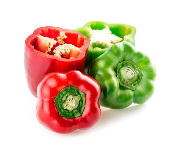 Fényes, piros és zöld ízletes paprika felsők eltávolítása - Fotó, kép