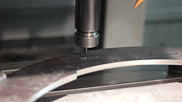 CNC machine engraving numbers on steel part. Close-up. - Footage, Video