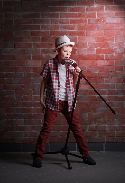 Little boy singing with microphone  - Fotoğraf, Görsel