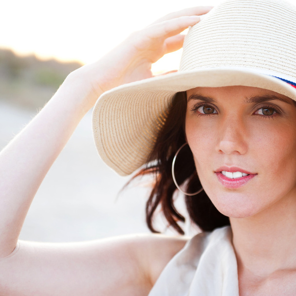 Summer portrait of beautiful woman wearing hat. Vacation at warm - Zdjęcie, obraz