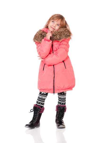 Little girl dressed with winter clothes - 写真・画像
