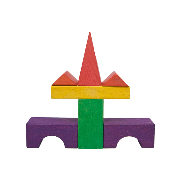 Замок створений з різнокольорових дерев'яних іграшок
 - Фото, зображення