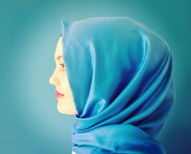 Beautiful young woman with a scarf - Valokuva, kuva
