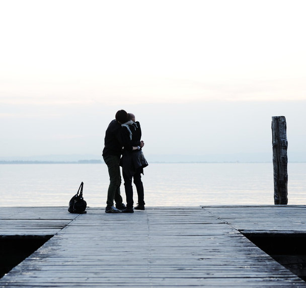 Couple on the wooden dock - Foto, afbeelding
