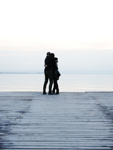 Couple on the wooden dock - 写真・画像
