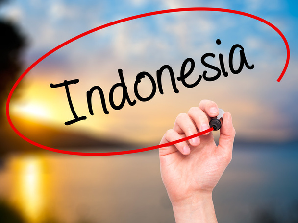 Man Hand writing Indonesia  with black marker on visual screen - Foto, Imagem