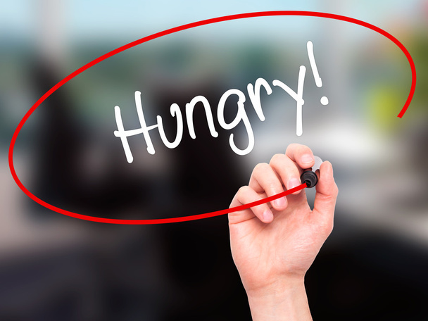 Muž ručně psaného hlad! černým fixem na vizuální displej - Fotografie, Obrázek