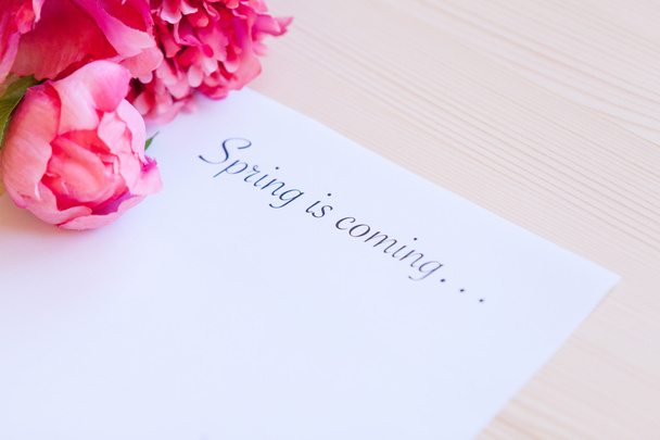 Paper with words Spring in coming - Photo, image
